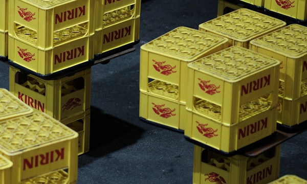 Stacked yellow crates ready for sale